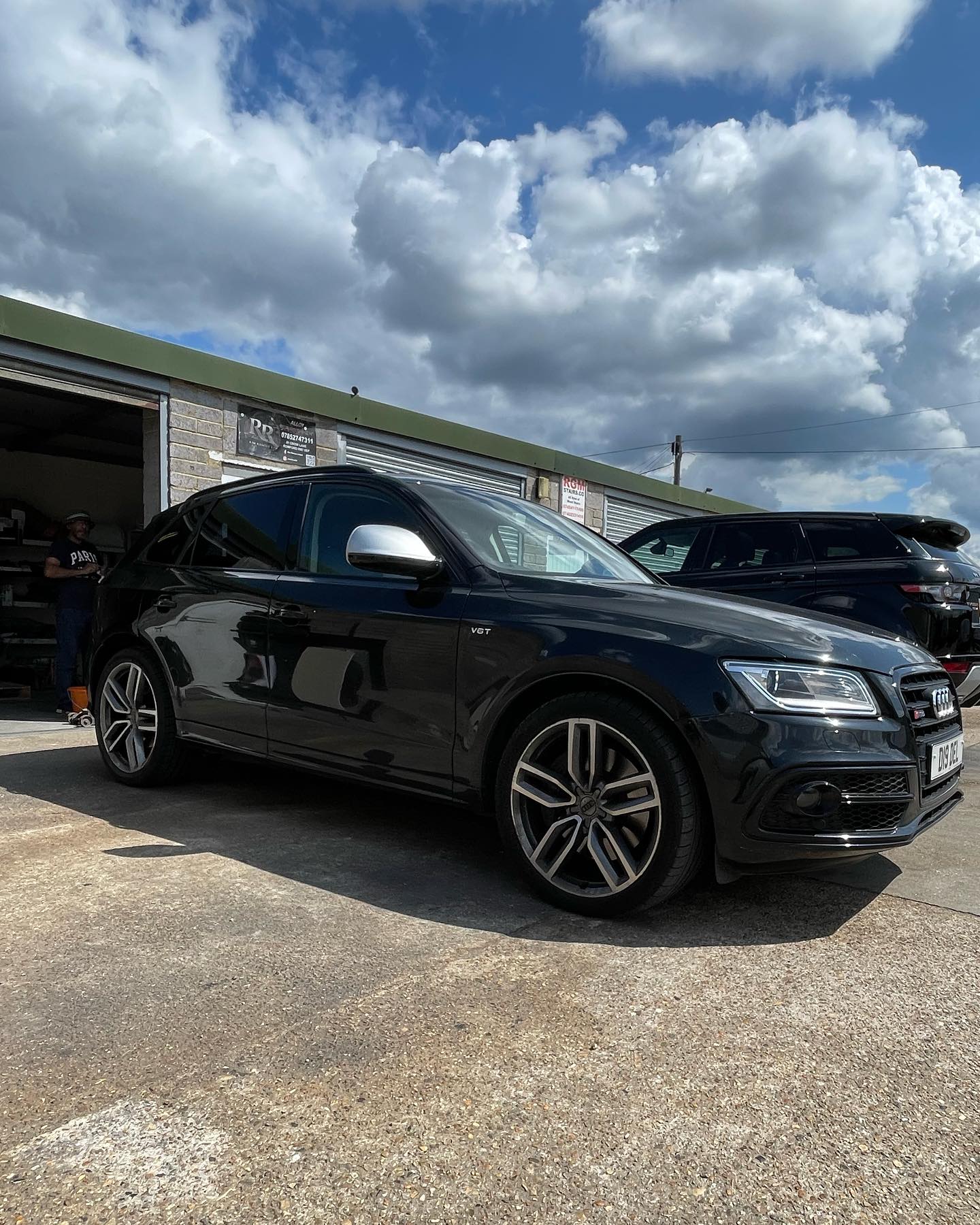 Audi SUV with scuffed alloys